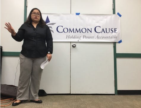 Common Cause executive director Corie Tanida fields questions about adding automatic voter registration to driver license applications at a press conference held at University of Hawaii at Manoa. 